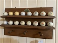Golf balls on display shelf