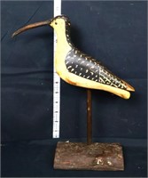 Vintage shorebird black/tan decoy on wood base
