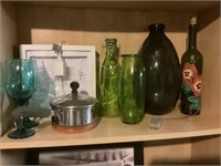 Shelf lot, of glass, bottles, and lighted,