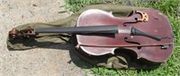 Small child's cello with mother of pearl bow in