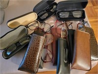COLLECTION OF EYE GLASSES AND CASES