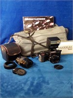Minolta Maxxum 5000 camera with case 
With Sigma