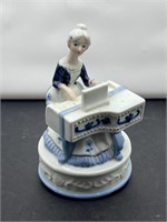 Blue & white music box lady playing piano