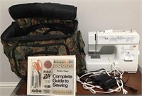 TAPESTRY ROLLING LUGGAGE WITH SEWING MACHINE