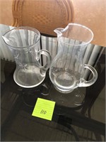 Two glass pitchers #110