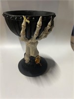 Skeleton hand candle holder