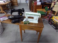 2 Singer sewing machines and cabinet
