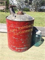 Old galvanized red paint gas can
