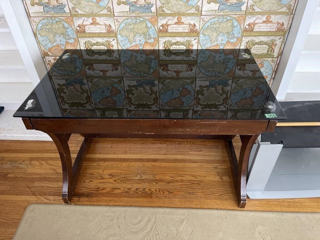 Table with glass top- has some scratches 28 x 48 x