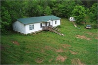 Home & 66.29+- Acres • Unrestricted • 4 Tracts