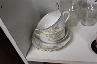 FLORAL DECORATED CUPS AND SAUCERS