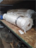 Three rolls of plastic sheeting reinforced