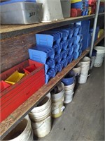 Row of Plastic storage containers, second shelf