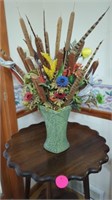 VASE WITH A FALL FLOWER ARRANGEMENT IN IT