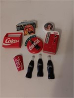 8 Coca-Cola Coke magnets.