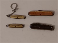 4 advertising pocket knives Made in the USA.