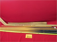 Five Vintage Pool Cues, Bat, Hockey Stick