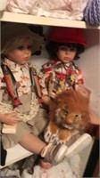 2 safari dolls,lion