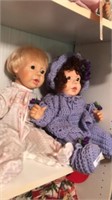 Purple and pink dolls