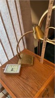 Metal desk, lamp, and clock