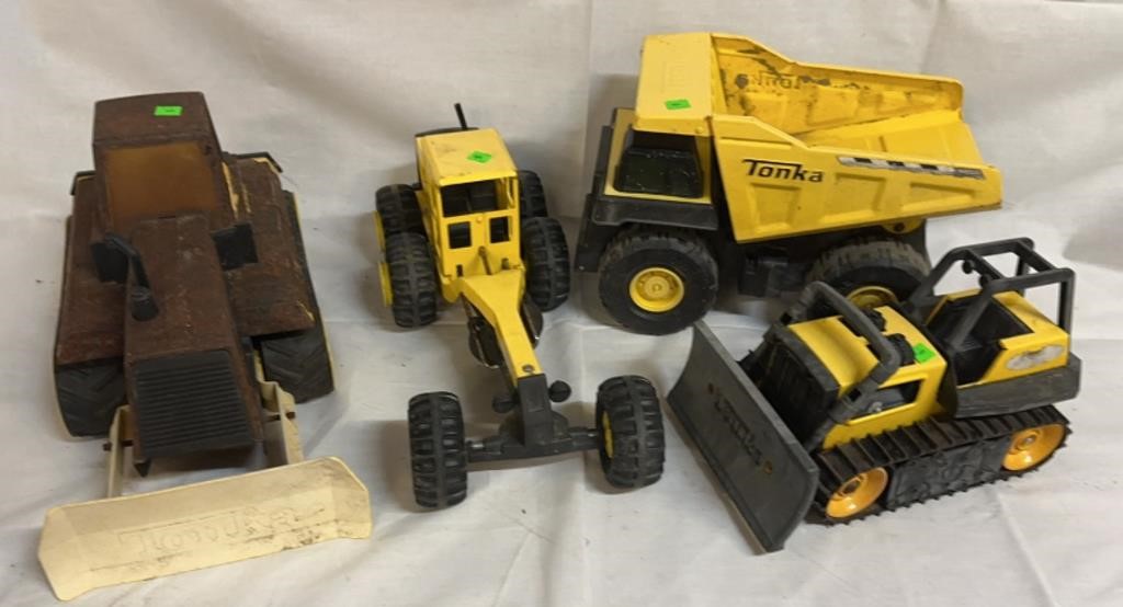 4) Metal Tonka Trucks