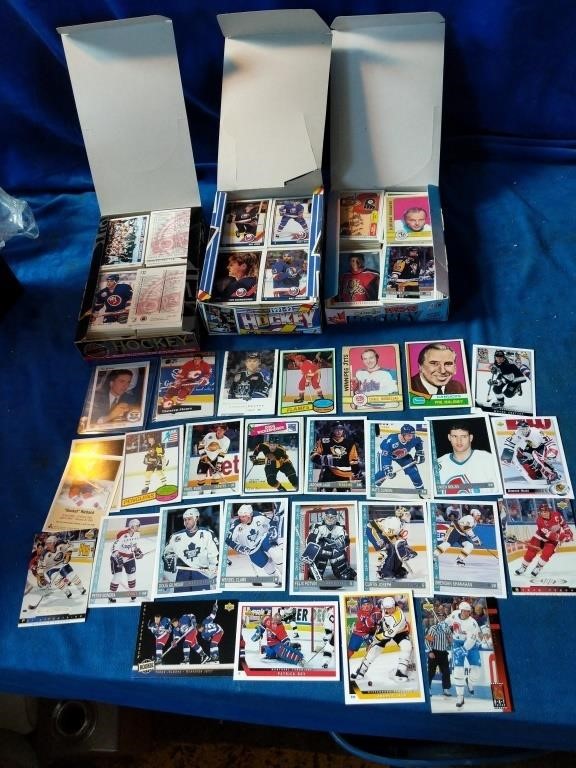 3 boxes of hockey cards etc