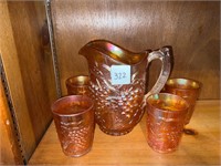 CARNIVAL GLASS PITCHER AND GLASSES