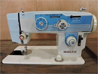 WHITE ELECTRIC SEWING MACHINE IN STOWAWAY