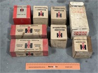 Assorted INTERNATIONAL HARVESTER Parts In Boxes