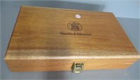 Wood Smith and Wesson box. Measures: 3.25" H x
