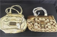 Pair of designer style handbags