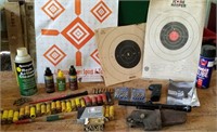 Ammo, targets, gun oil, holster