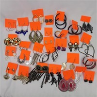 Huge lot of carded costume earrings