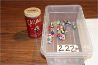 marbles in a Calumet can
