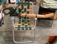 Vintage aluminum lawn chair with webbing and a