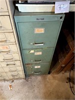 Metal Filing Cabinet With Old Electric Equipment.