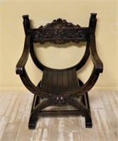 Renaissance Revival Carved Oak Savonarola Chair.