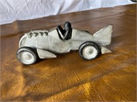 Vintage cast iron model racing car
