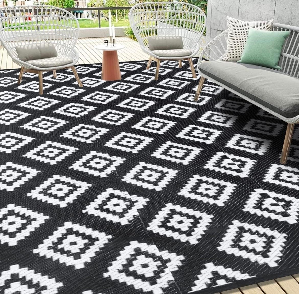 USED $96 (9x12') Reversible Plastic Patio Rug