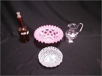 Four glass items: two opalescent bowls, one