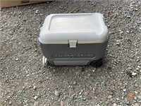 Cooler with handle on wheels