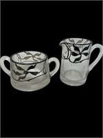 Glass cream sugar with silver overlay design