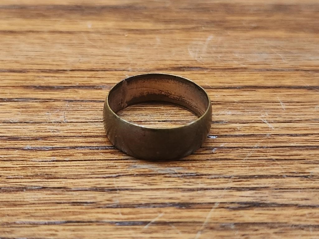 WEDDING BAND MARKED "SOLID GOLD"