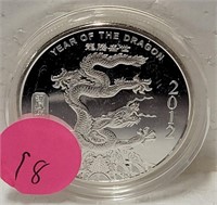 2012 YEAR OF THE DRAGON 1 TROY OZ. SILVER ROUND
