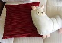 Red Throw Pillow and Stuffed Animal