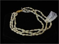14k GOLD clasp 3- strand freshwater Pearl