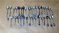 COLLECTIBLE SPOONS AND A FORK