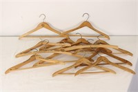 COLLECTION OF WOODEN HOTEL COAT HANGERS