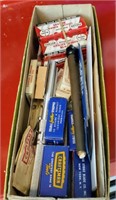 Box of tire gauges and utility knife blades,
