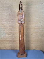 Carved wood monk statue